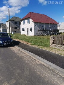 Продам дом в г. Узда в зоне коттеджной застройки.