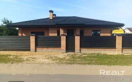 Современный кирпичный дом с участком