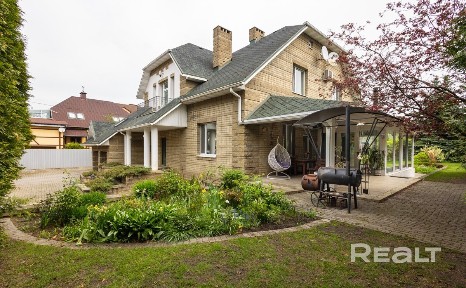 Элитный коттедж 561,5 м2 с бассейном и зимним садом в Минске