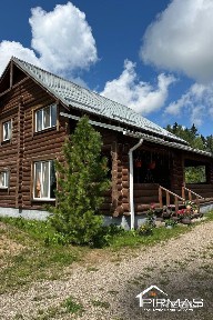 Современный бревенчатый дом с участком 17,43 сотки в г. Островец рядом с лесом